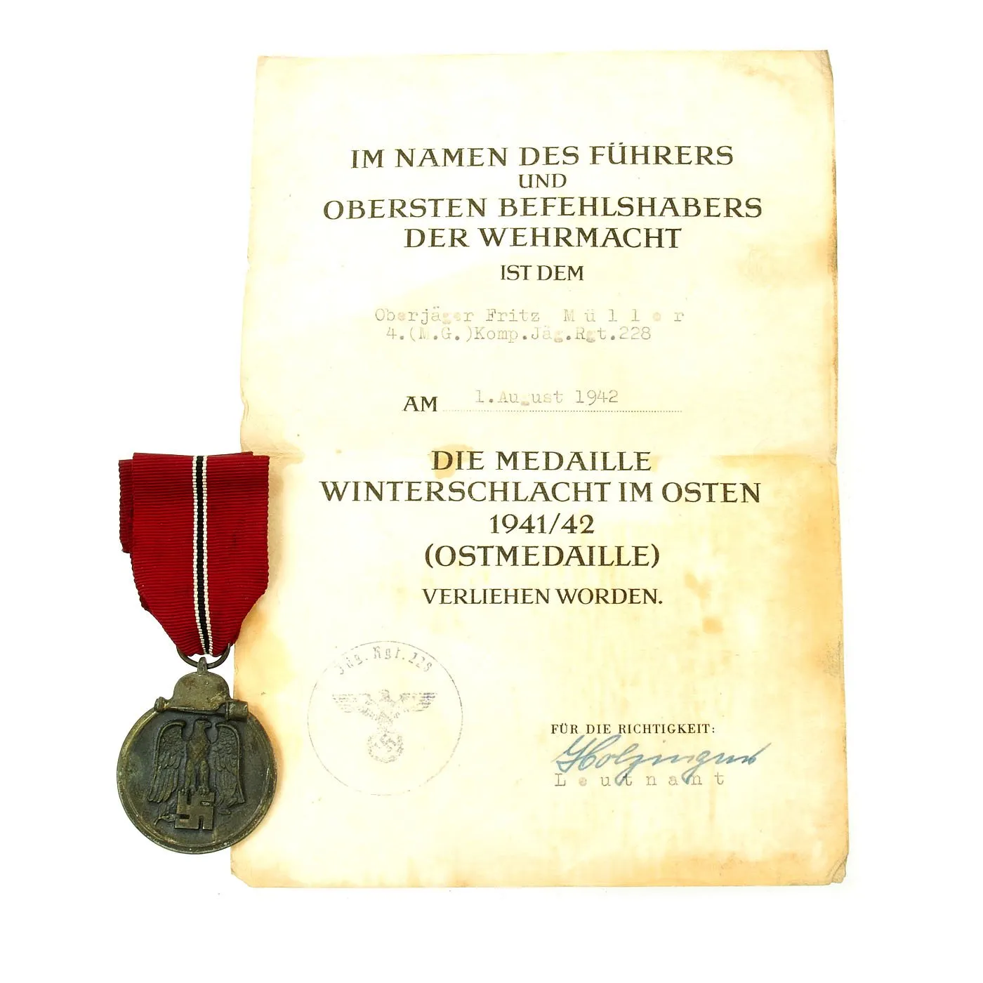 Original German WWII Eastern Front Medal with Award Document Dated 1942